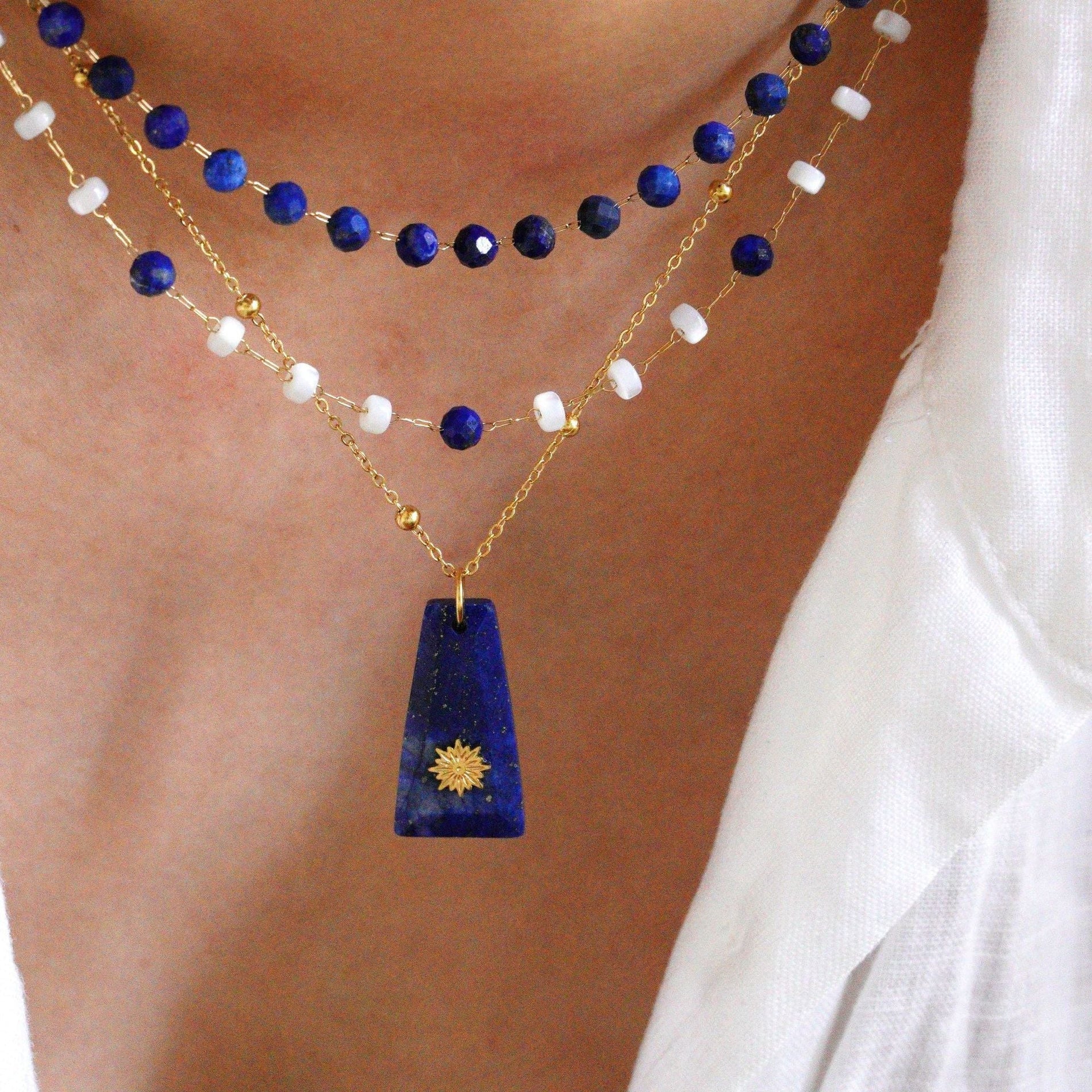 The delicate gold sunbeam detail on the pendant is our little love letter to you.